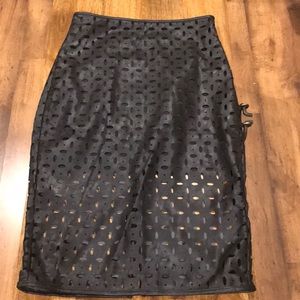 Banana republic faux leather laser cut out skirt.